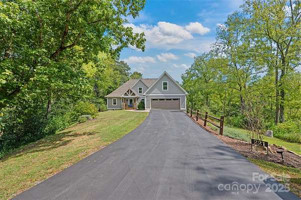 11.8 Acres of Land with Home for Sale in Marshall, North Carolina