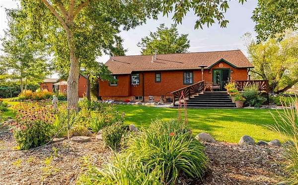 13.7 Acres of Land with Home for Sale in Cody, Wyoming