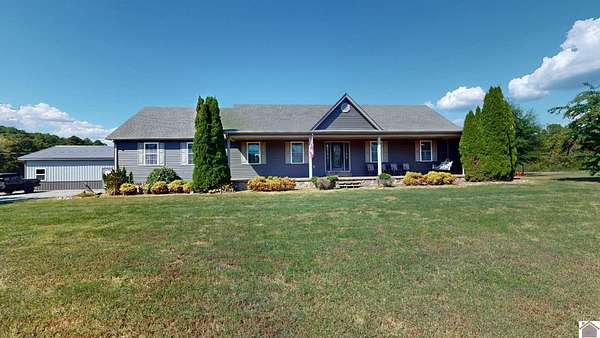 14.7 Acres of Land with Home for Sale in New Concord, Kentucky