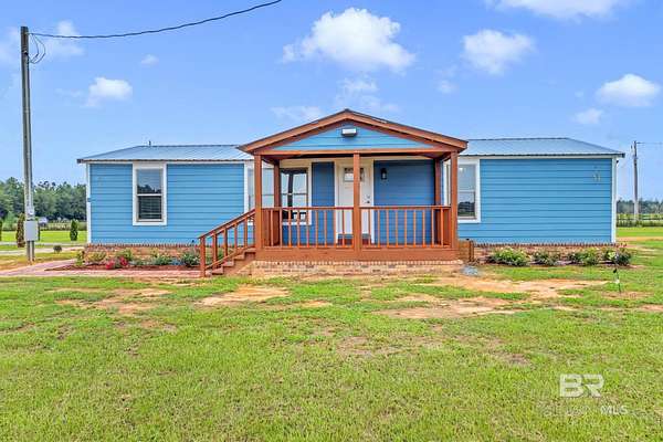 3.8 Acres of Residential Land with Home for Sale in Elberta, Alabama