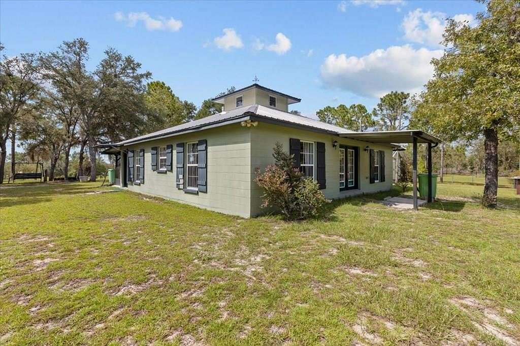 9.18 Acres of Land with Home for Sale in Archer, Florida