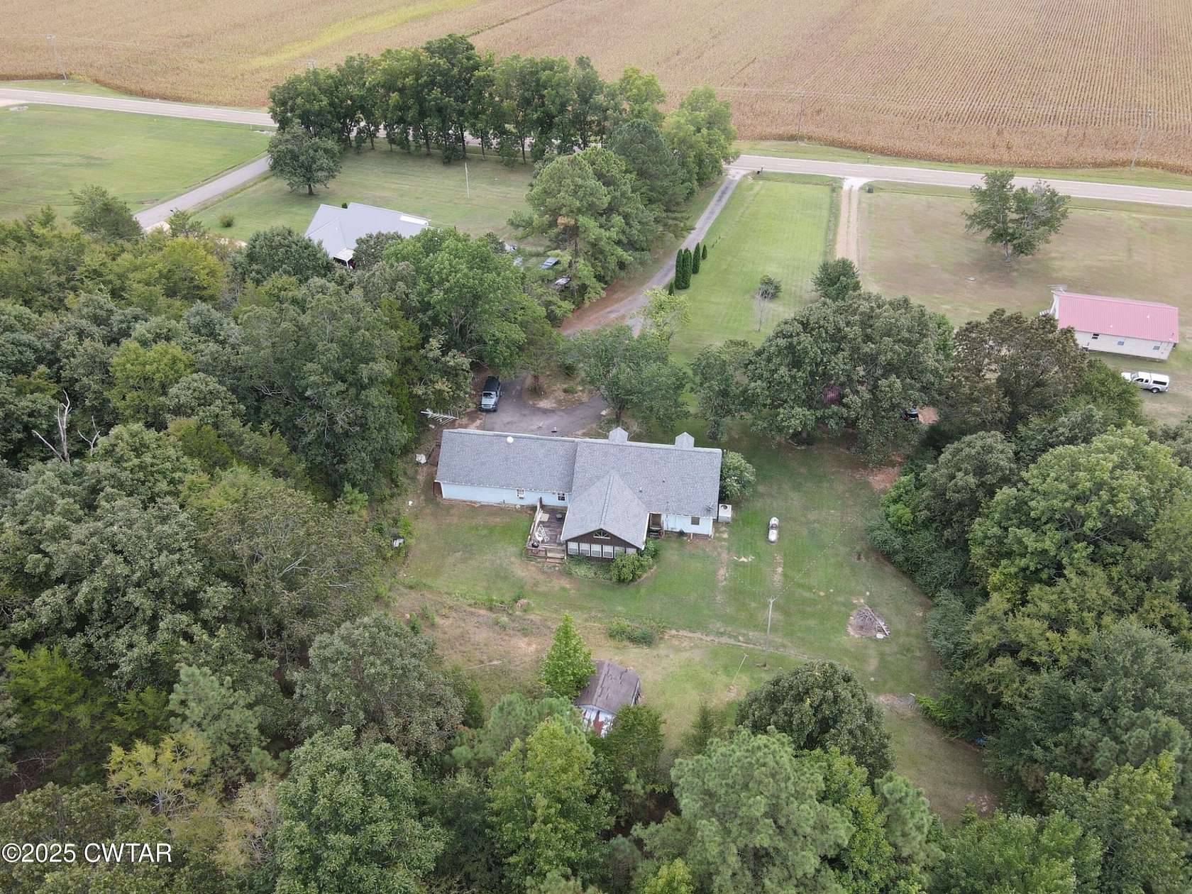 4.2 Acres of Residential Land with Home for Sale in Selmer, Tennessee