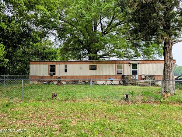 5.29 Acres of Residential Land with Home for Sale in Jackson, Tennessee