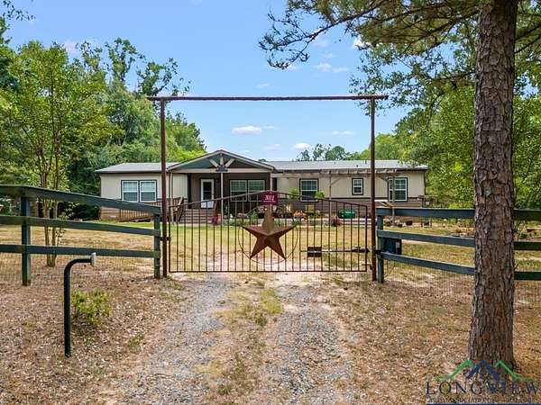 2.34 Acres of Residential Land with Home for Sale in Marshall, Texas