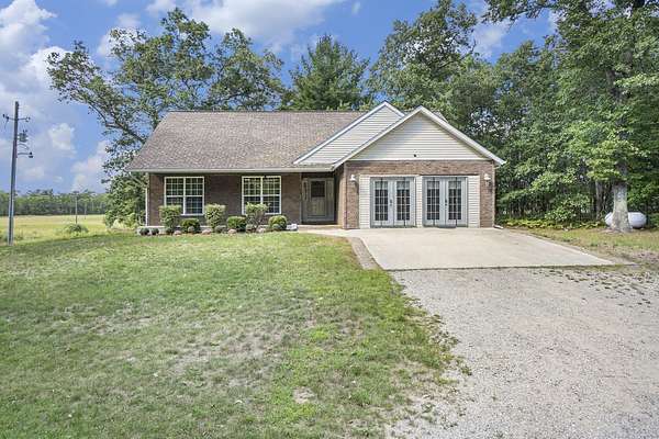 22.2 Acres of Land with Home for Sale in Bitely, Michigan
