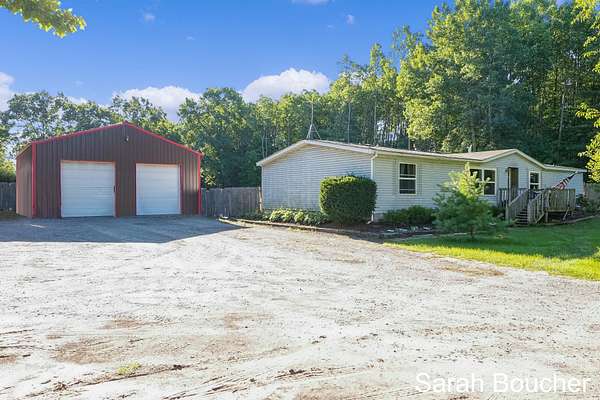4.88 Acres of Residential Land with Home for Sale in Fruitport, Michigan