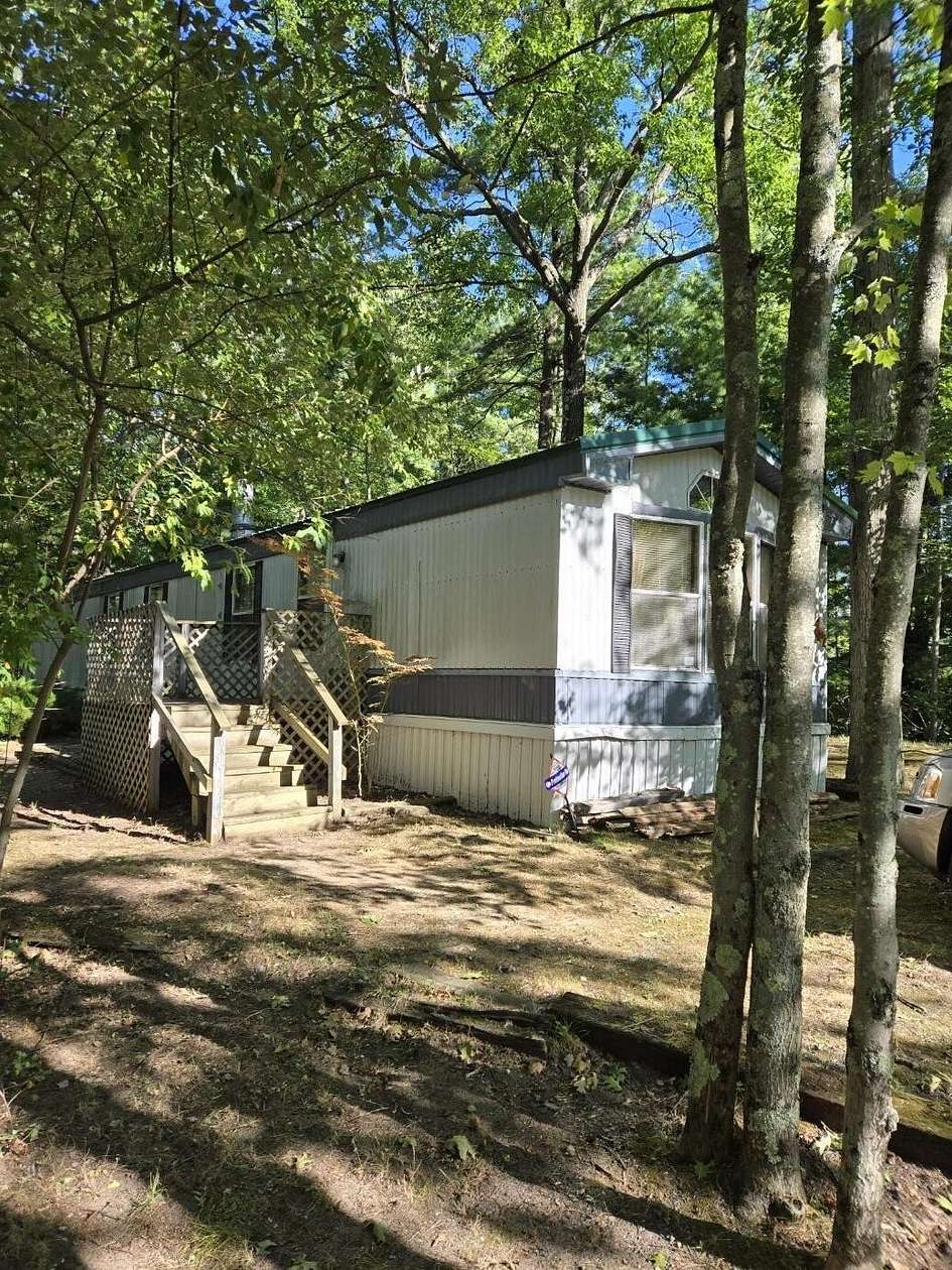 0.48 Acres of Residential Land with Home for Sale in Bitely, Michigan