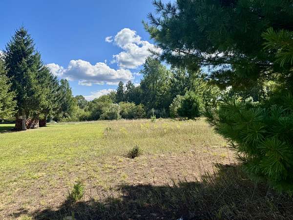 0.82 Acres of Residential Land for Sale in Canadian Lakes, Michigan
