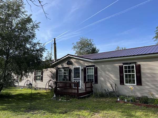 5.5 Acres of Residential Land with Home for Sale in Luther, Michigan