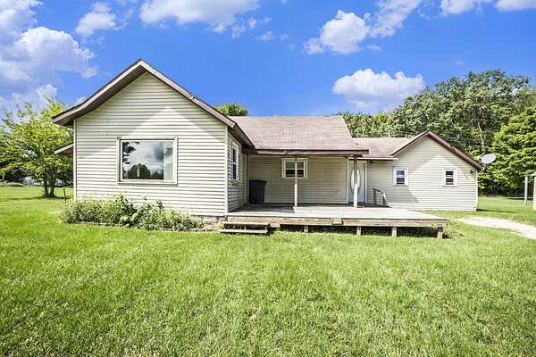 10 Acres of Land with Home for Sale in Coral, Michigan