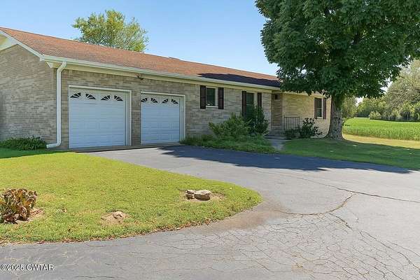 9.8 Acres of Residential Land with Home for Sale in Saltillo, Tennessee