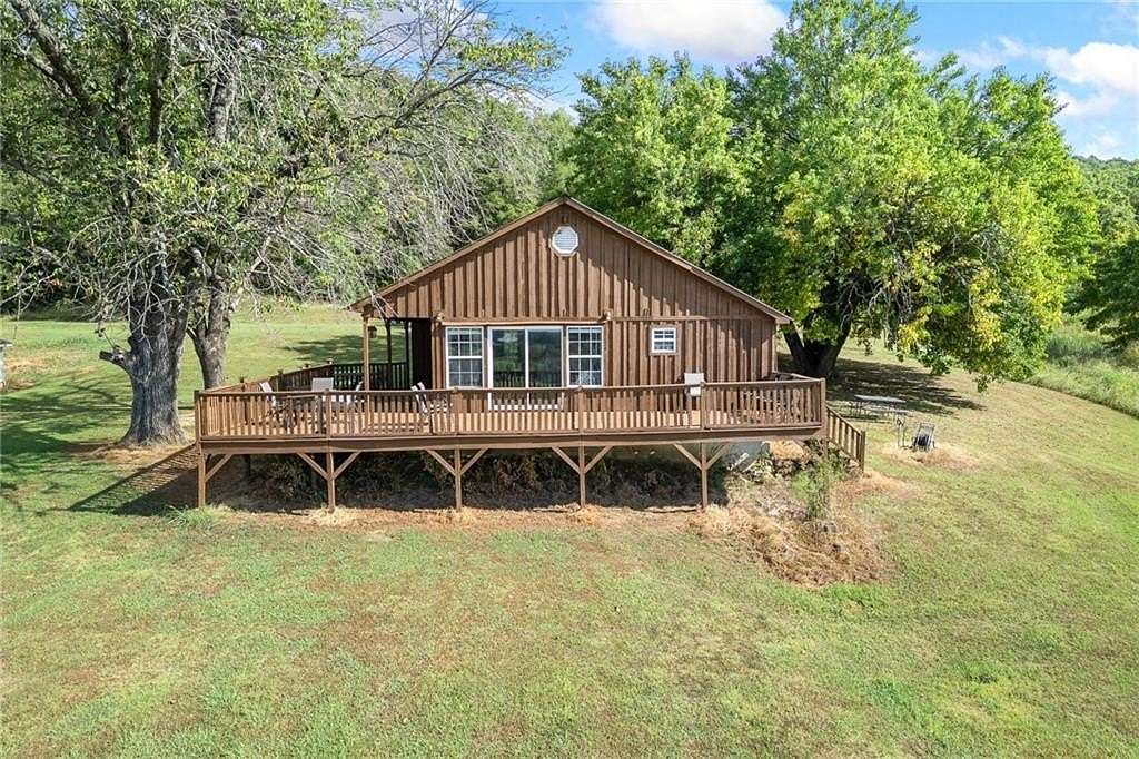 90 Acres of Land with Home for Sale in St. Joe, Arkansas