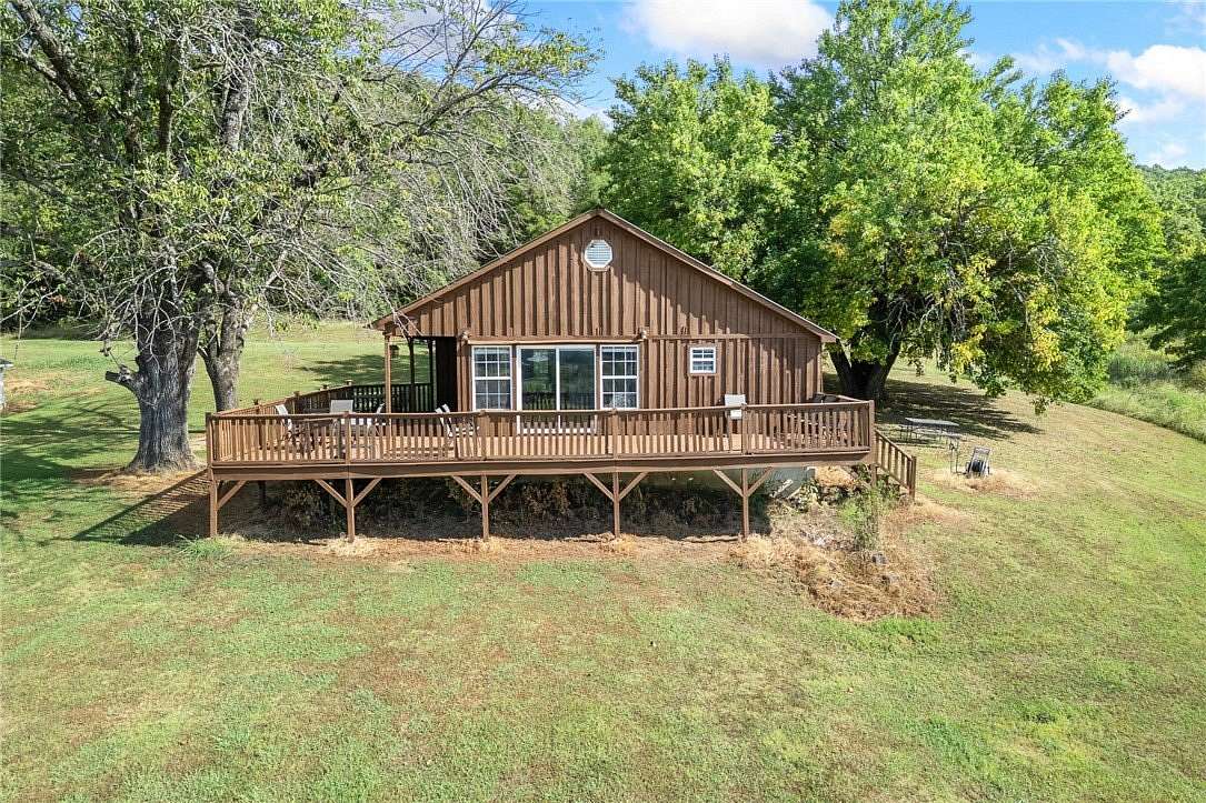 90 Acres of Land with Home for Sale in St. Joe, Arkansas