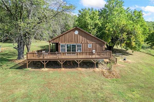 90 Acres of Land with Home for Sale in St. Joe, Arkansas