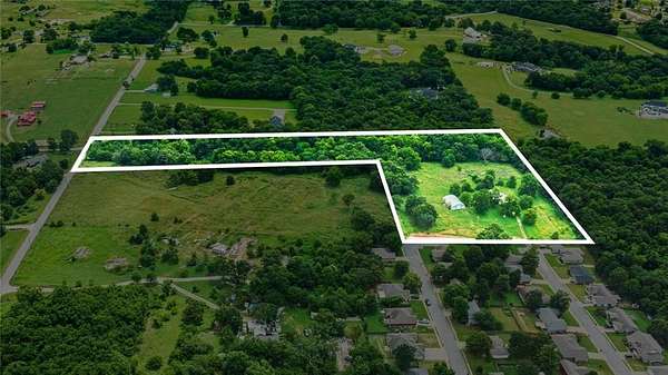 6 Acres of Residential Land for Sale in Cave Springs, Arkansas