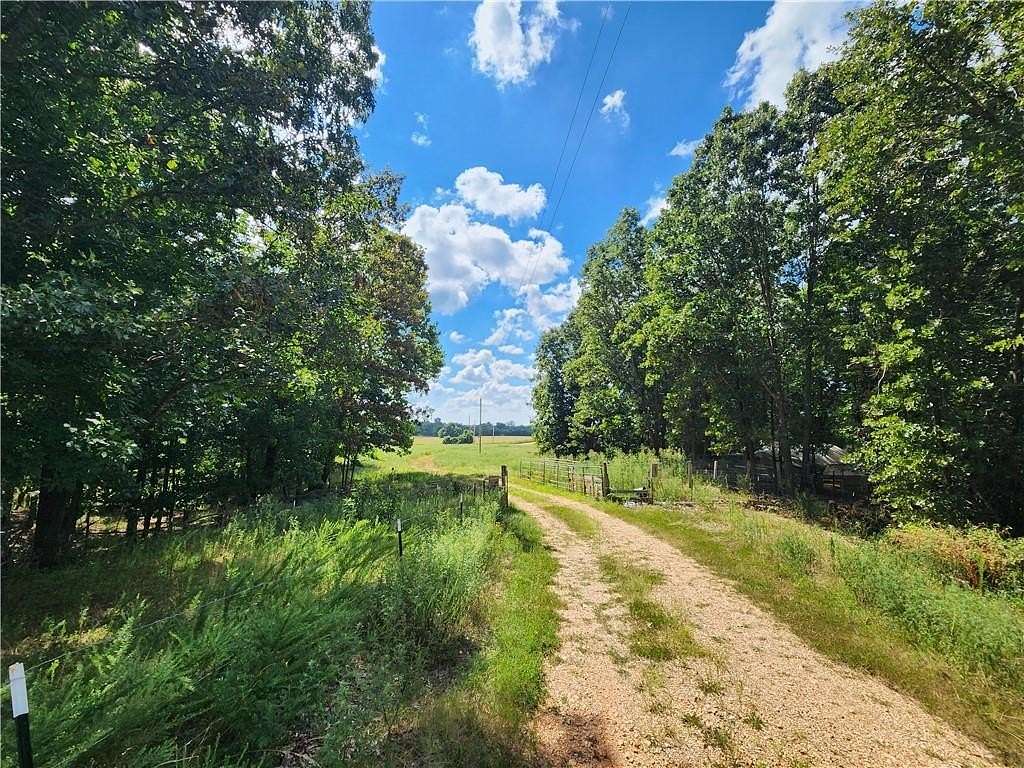77 Acres of Land with Home for Sale in Jay, Oklahoma