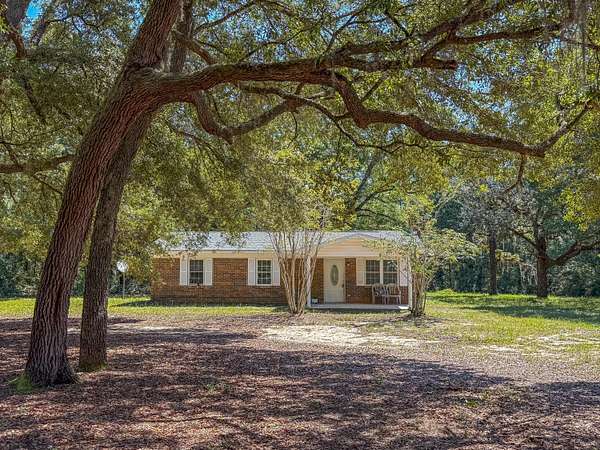 2 Acres of Residential Land with Home for Sale in Baker, Florida