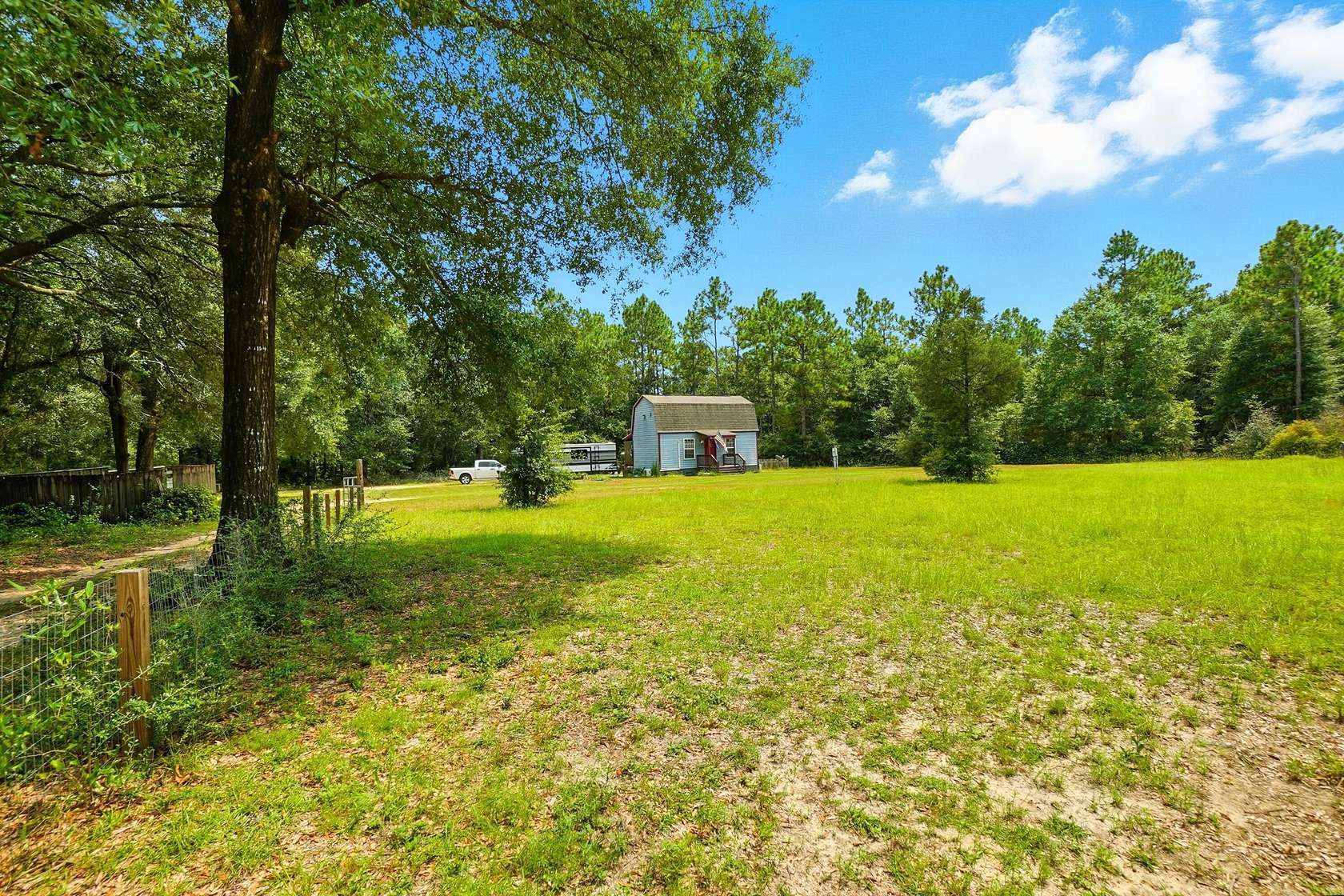 3.4 Acres of Residential Land with Home for Sale in Holt, Florida