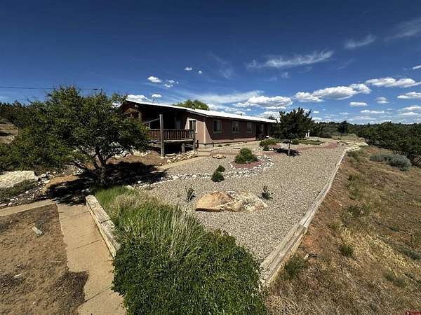 35.8 Acres of Recreational Land with Home for Sale in Dolores, Colorado
