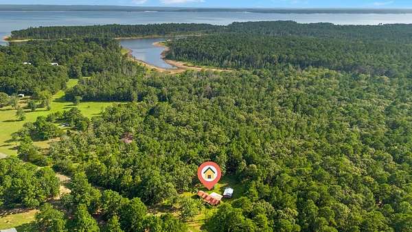 5.72 Acres of Residential Land with Home for Sale in San Augustine, Texas