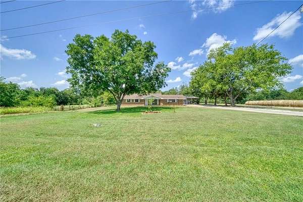 2 Acres of Residential Land with Home for Sale in Madisonville, Texas