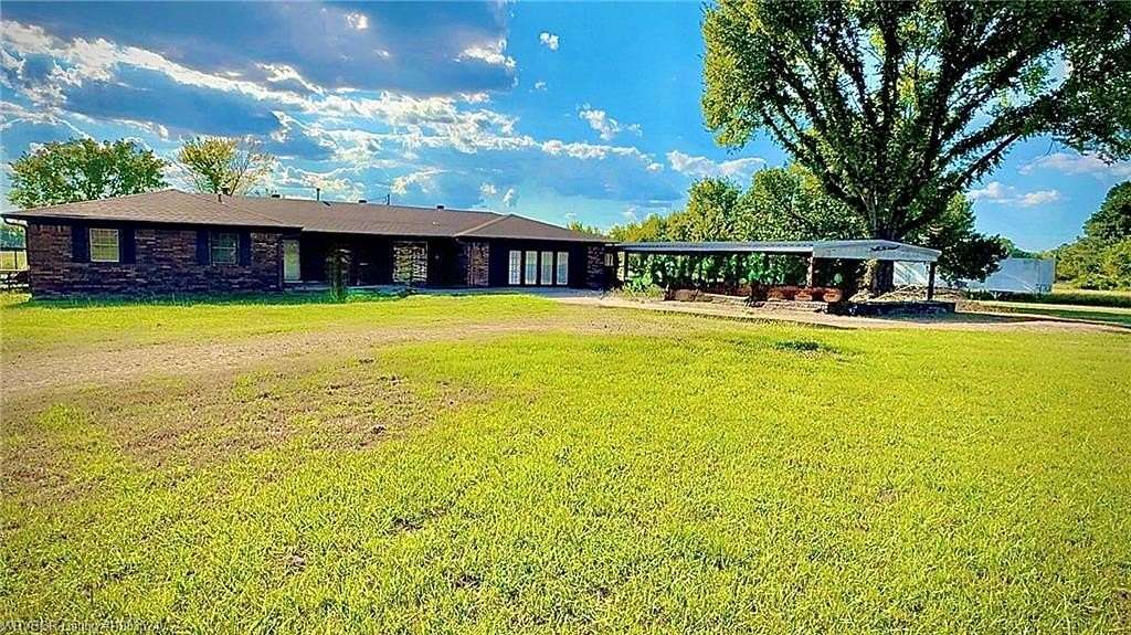 5 Acres of Land with Home for Sale in Muldrow, Oklahoma
