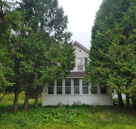 15.1 Acres of Land with Home for Sale in Cadyville, New York