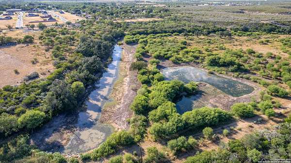 27.5 Acres of Recreational Land with Home for Sale in Uvalde, Texas