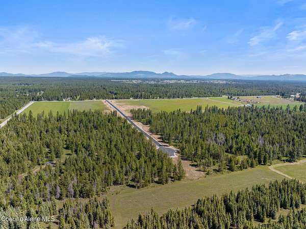 5 Acres of Residential Land with Home for Sale in Athol, Idaho