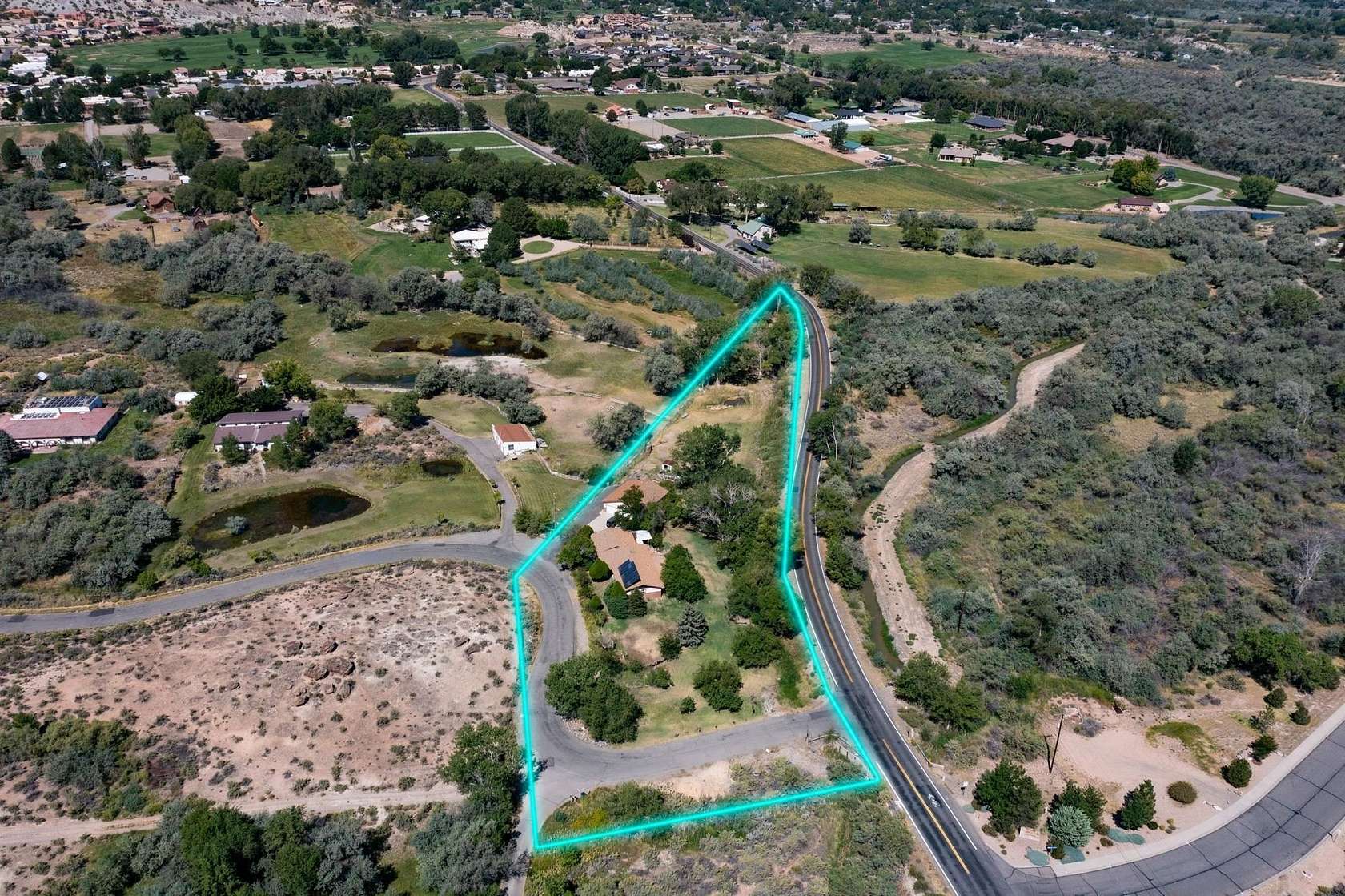 3 Acres of Residential Land with Home for Sale in Grand Junction, Colorado