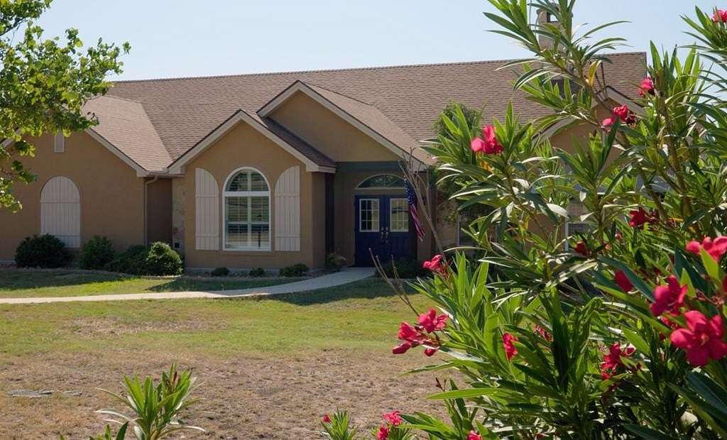 2.49 Acres of Residential Land with Home for Sale in Ingram, Texas