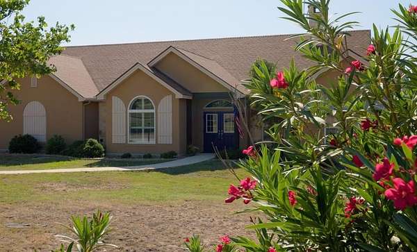 2.49 Acres of Residential Land with Home for Sale in Ingram, Texas