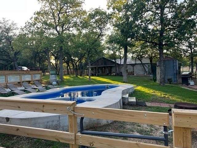 9.8 Acres of Residential Land with Home for Sale in Fredericksburg, Texas