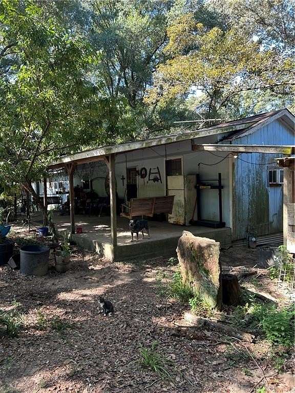 10 Acres of Land with Home for Sale in Semmes, Alabama