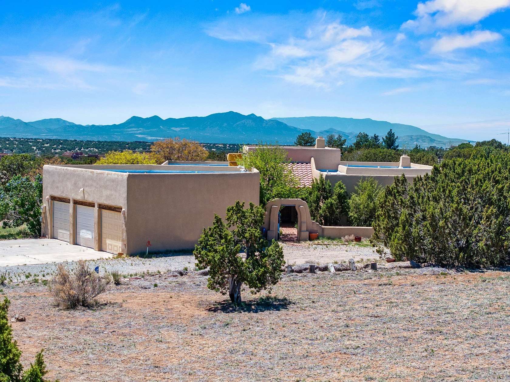 5 Acres of Residential Land with Home for Sale in Lamy, New Mexico