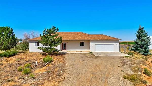 23 Acres of Land with Home for Sale in Yellow Jacket, Colorado