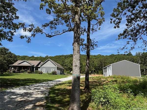 10.4 Acres of Land with Home for Sale in Harrison, Arkansas