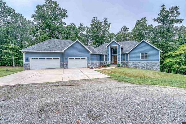8.25 Acres of Land with Home for Sale in Mountain Home, Arkansas