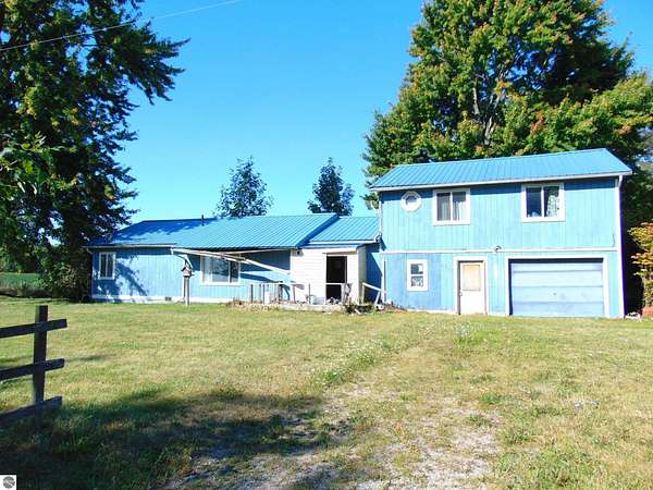 1.8 Acres of Residential Land with Home for Auction in Coleman, Michigan