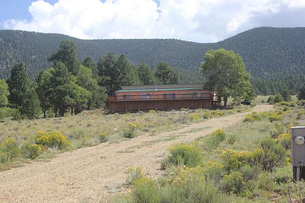 5 Acres of Residential Land with Home for Sale in Eagle Nest, New Mexico