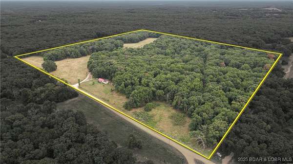51 Acres of Agricultural Land with Home for Sale in Cole Camp, Missouri