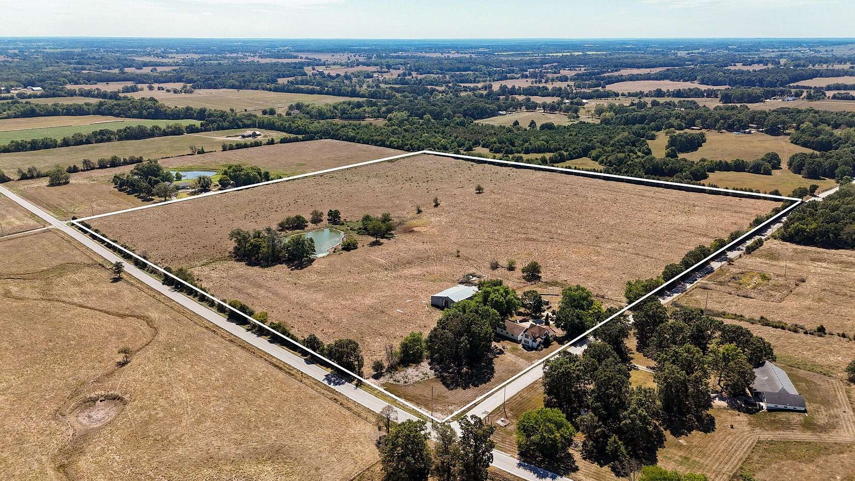 39 Acres of Agricultural Land with Home for Sale in Billings, Missouri