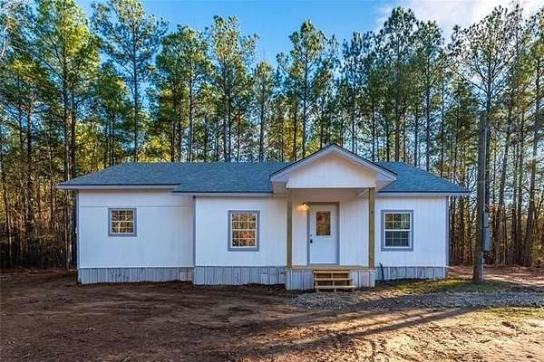 7.29 Acres of Residential Land with Home for Sale in Mount Pleasant, Texas