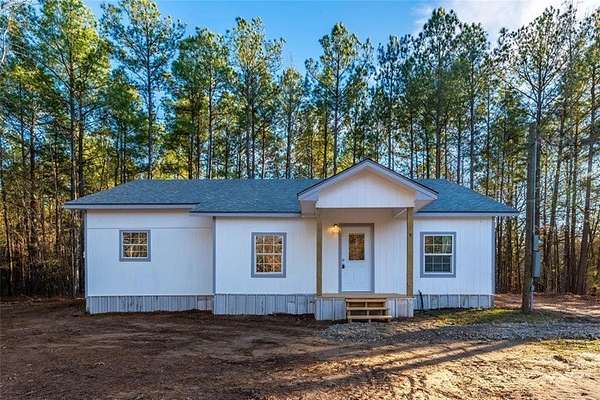 5.29 Acres of Land with Home for Sale in Mount Pleasant, Texas