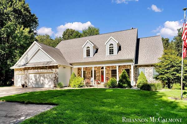 2.1 Acres of Residential Land with Home for Sale in Rockford, Michigan