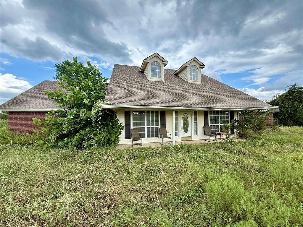 2.42 Acres of Residential Land with Home for Sale in Glen Rose, Texas