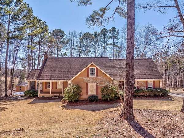 7.87 Acres of Land with Home for Sale in Dallas, Georgia