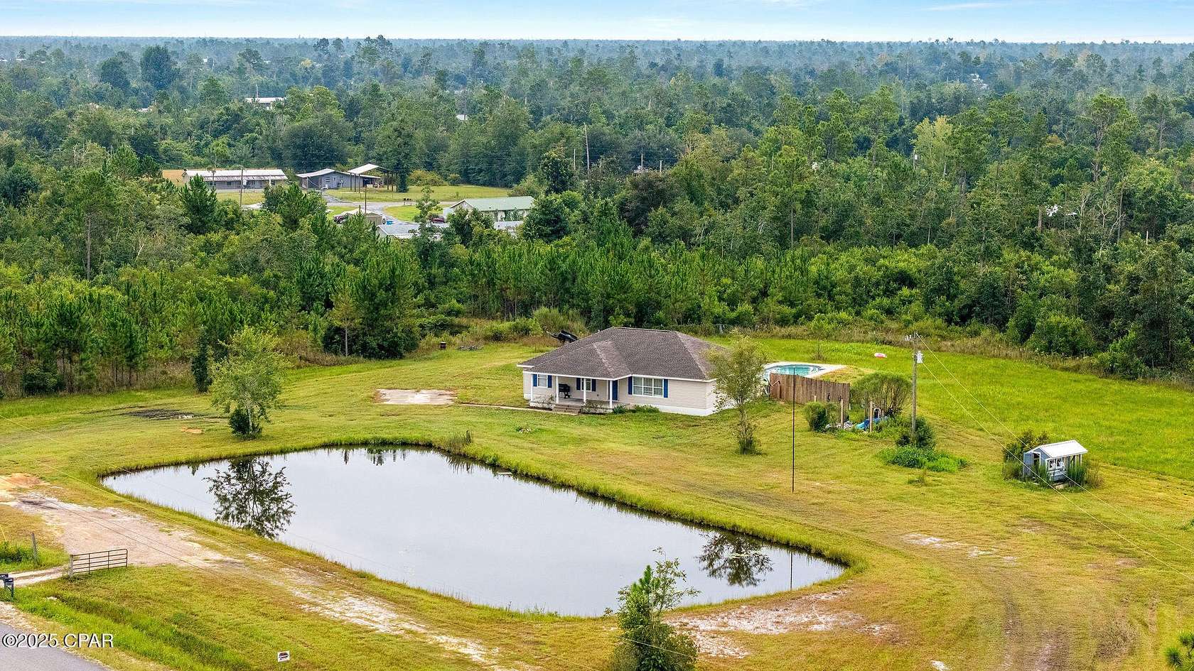 6.68 Acres of Residential Land with Home for Sale in Youngstown, Florida