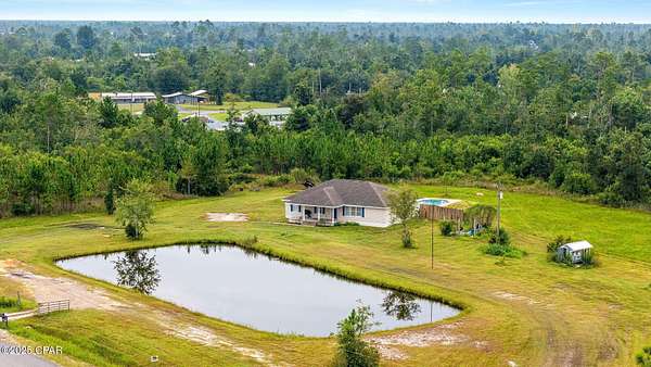 6.68 Acres of Residential Land with Home for Sale in Youngstown, Florida