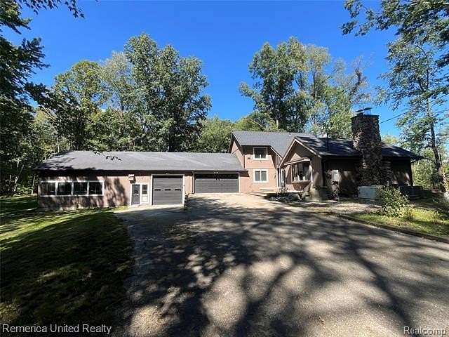 4 Acres of Land with Home for Sale in Howell, Michigan